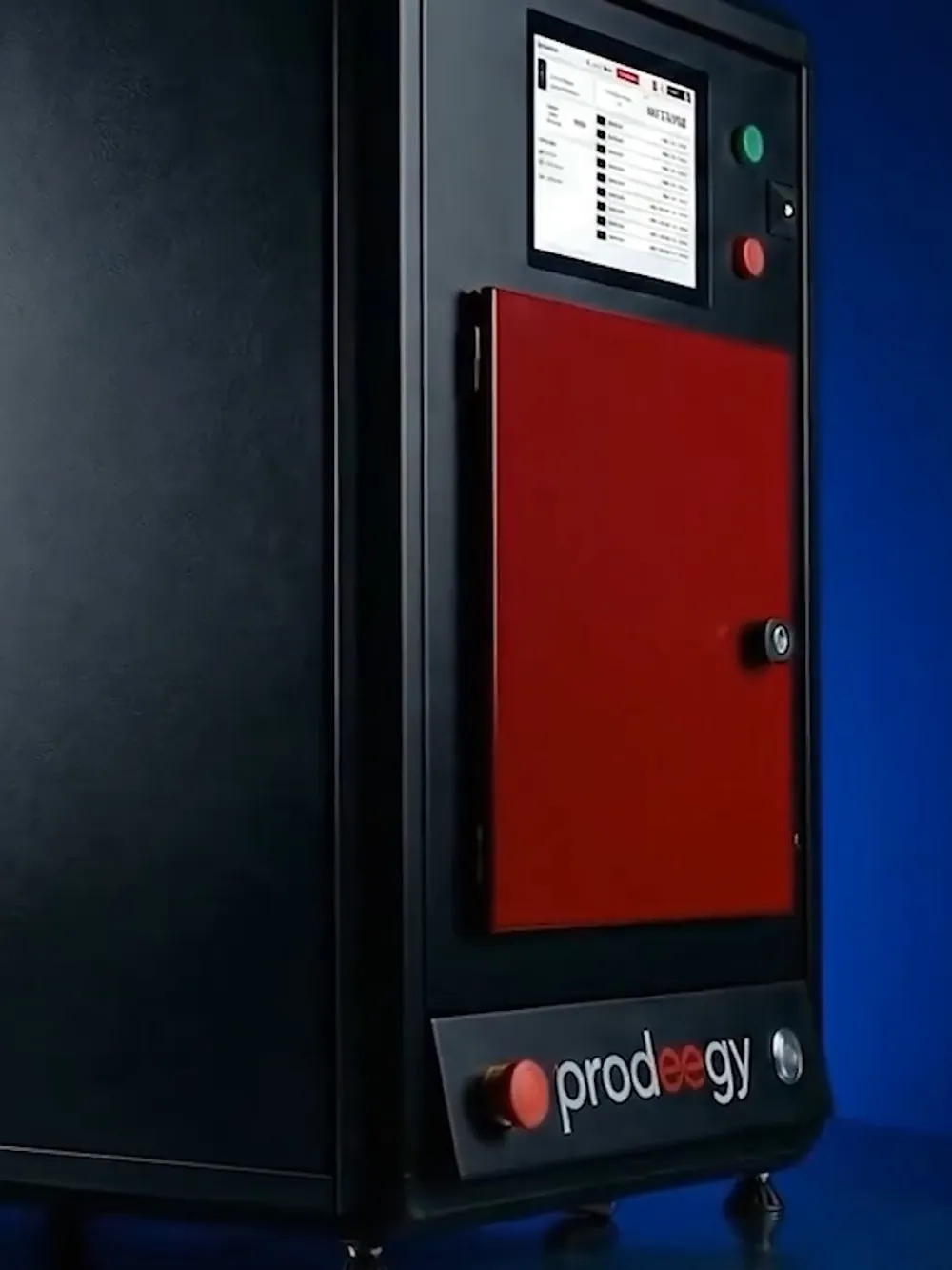 The Prodeegy test cabinet, a tall black and red enclosure with a touchscreen on its door